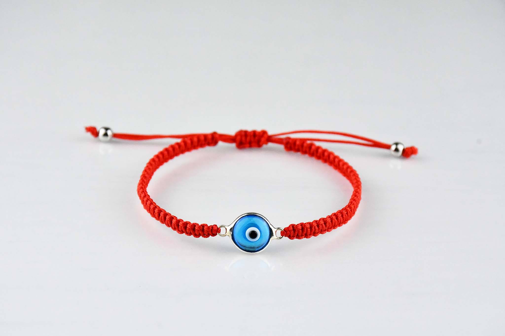 Red bracelet with on sale eye